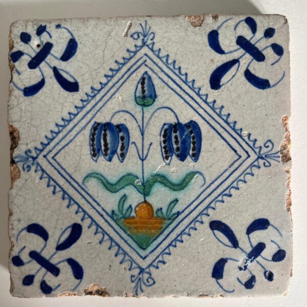 Delft Tile with a chess flower - 17th century
