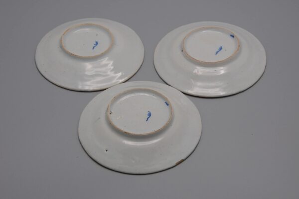 Set of hand-painted miniature polychrome plates with Delft peacock decor, ca 1900