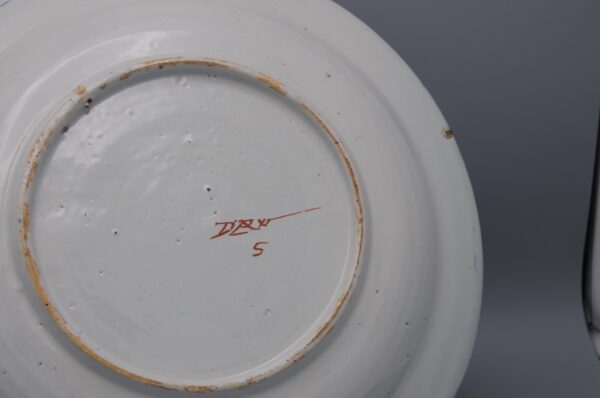 Pair of 18th century polychrome Delft blue, green and orange plates by 'De Paauw'