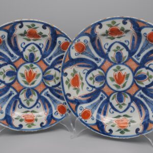 Pair of 18th century polychrome Delft blue, green and orange plates by 'De Paauw'