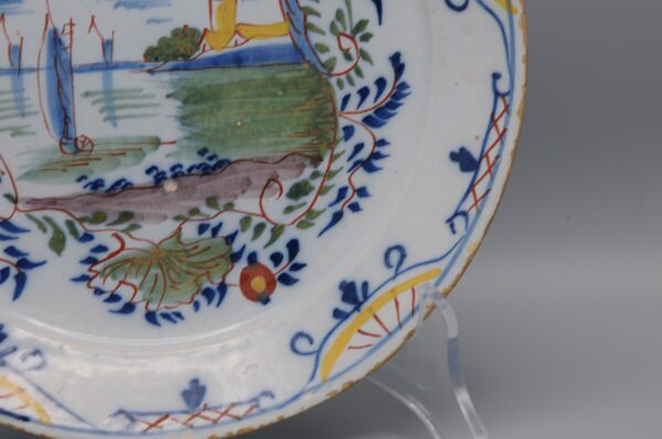 Delft polychrome plate with a cartouche depicting ships - mid 18th century