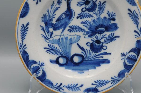 Delft blue and white plate depicting a bird - Early 19th century