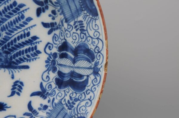 Pair of Delft 'Peacock' chargers by Pieter Paree - second half 18th century