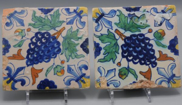 Polychrome Delft Tiles (pair) with grapes, early 17th centuryPolychrome Delft Tiles (pair) with grapes, early 17th century