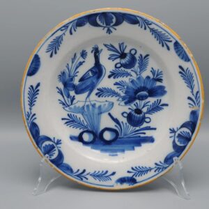 Delft blue and white plate depicting a bird - Early 19th century