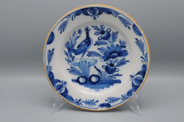 Delft blue and white plate depicting a bird - Early 19th century
