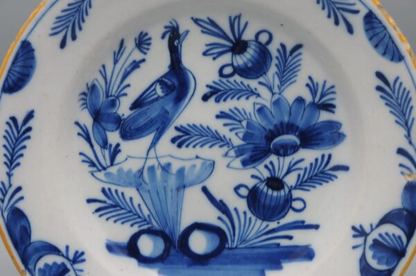 Delft blue and white plate depicting a bird - Early 19th century