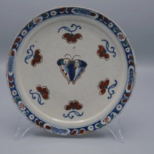 Delft polychrome plate with a butterfly - early 18th century