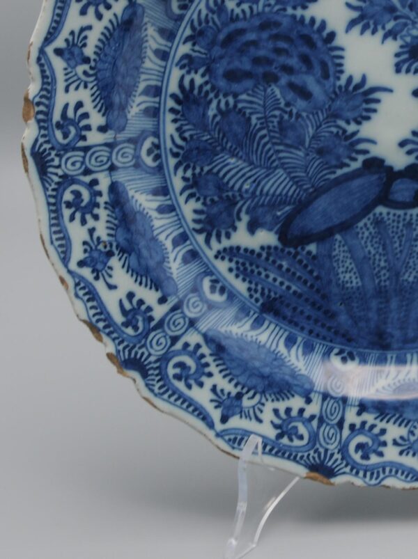 Delft Kangxi style charger, 'The Porcelain Axe', 18th century