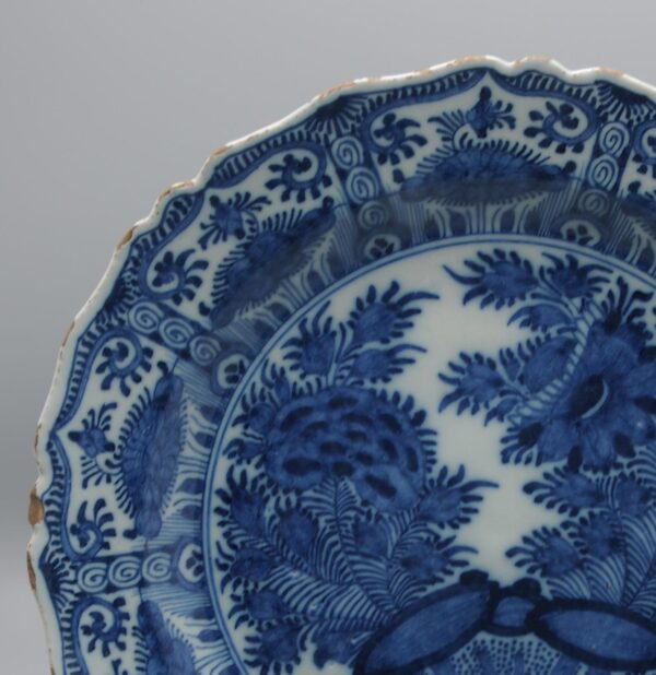 Delft Kangxi style charger, 'The Porcelain Axe', 18th century