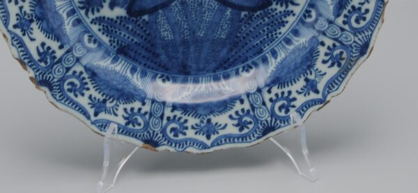 Delft Kangxi style charger, 'The Porcelain Axe', 18th century