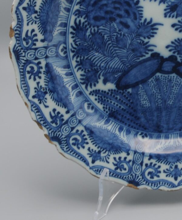 Delft Kangxi style charger, 'The Porcelain Axe', 18th century
